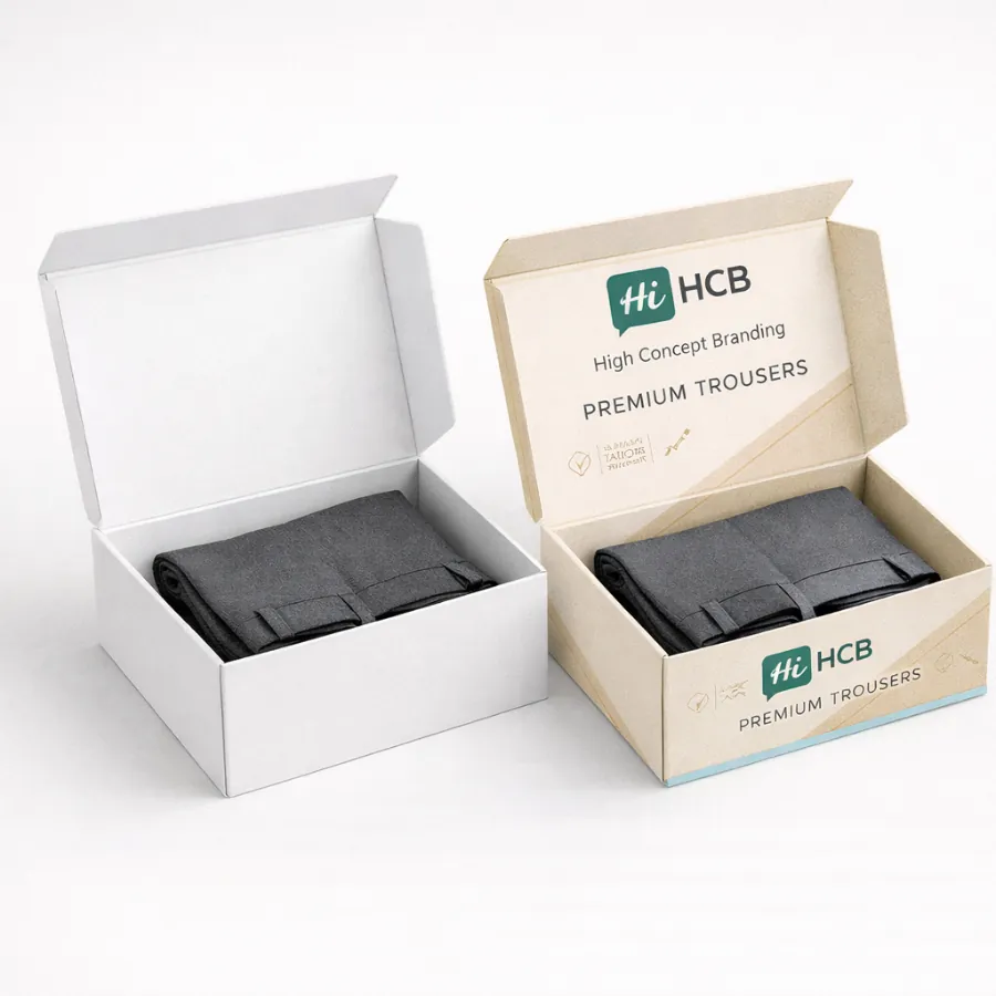Two open cardboard mailer boxes displaying folded trousers- showcasing custom printed logos and interior lid designs-